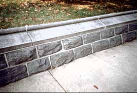 Caulking was inappropriately used here in place of mortar on the top