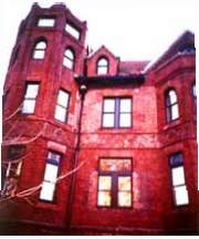 Unskilled repointing has negatively impacted the character of this late-19th century building.