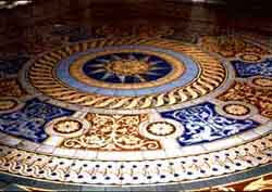 Encaustic floor tiles were decorated with traditional as well as original designs. Over time, the decorations can be worn thin by heavy traffic.